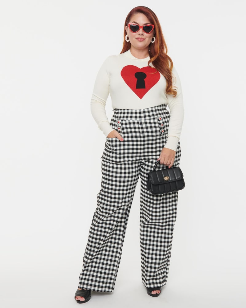 Front of a model wearing a size 4X/22-24 Unique Vintage Plus Size Black Gingham Ginger Pants in Black Gingham by Unique Vintage. | dia_product_style_image_id:270077